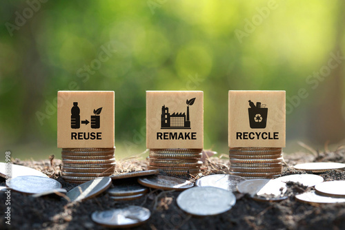 Circular economy concept. REMAKE and RECYCLE written on wooden blocks  Sustainable strategy approach to eliminate waste and pollution for future growth of business and environment, photo