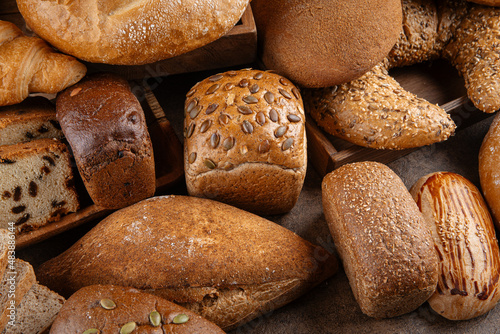Closeup on assorted variety of fresh baked loaves of bread