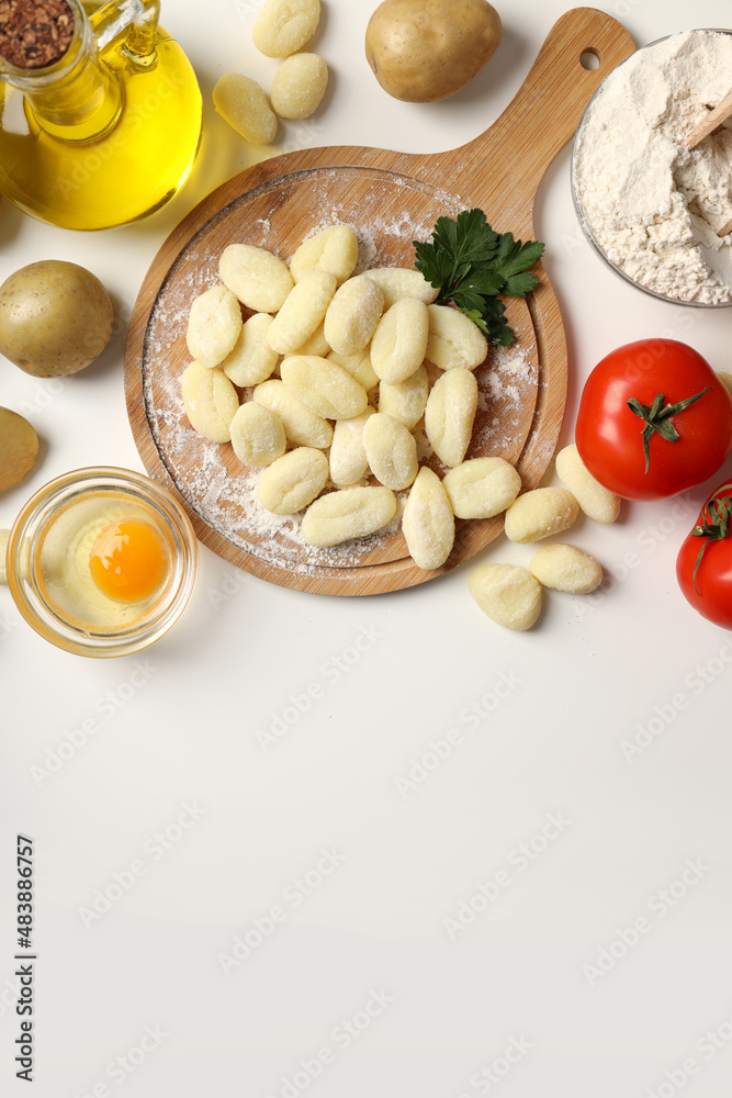 Concept of cooking with potato gnocchi on white background Concept of cooking with potato gnocchi on white background