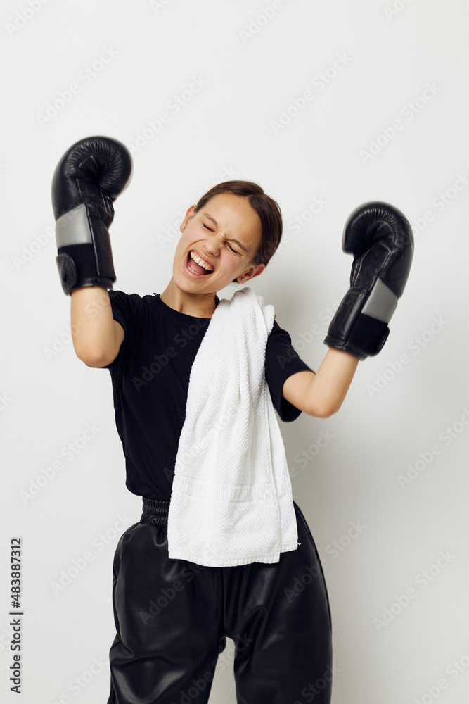 young beautiful woman with towel boxing black gloves posing sports fitness training young beautiful woman with towel boxing black gloves posing sports fitness training