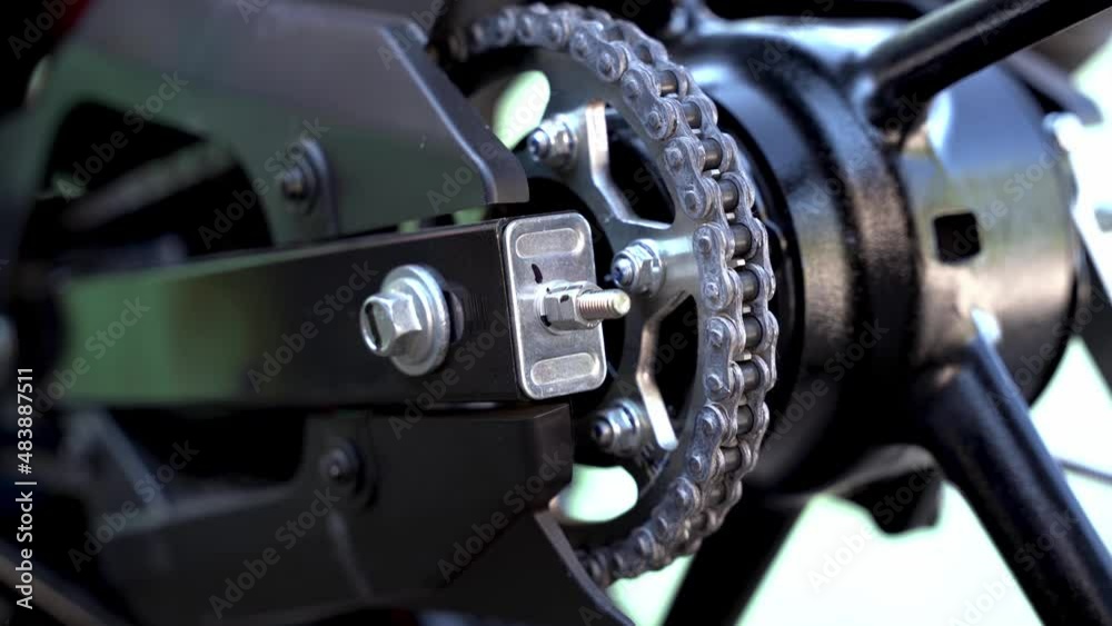 close up of a chain of a motorcycle close up of a chain of a motorcycle