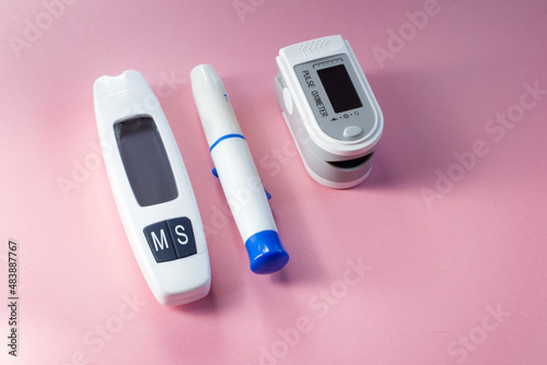 A blood glucose meter for measuring blood sugar and a pulse oximeter for measuring blood oxygen levels.