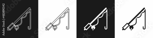 Set Fishing rod icon isolated on black and white background. Catch a big fish. Fishing equipment and fish farming topics. Vector