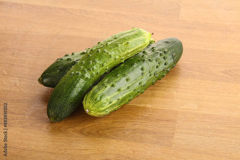 Fersh juicy green cucumbers heap Fersh juicy green cucumbers heap