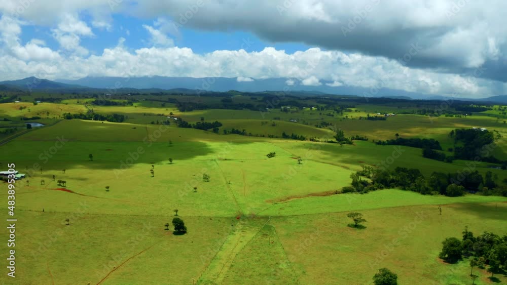 Panoramic View Of Greenery Plains Against Sky With Cloudscape In Atherton Tablelands, QLD Australia. Aerial Wide