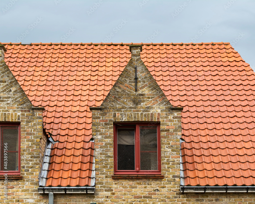 Old house dormer windows in Damme, A municipality located in the Belgian province of West Flanders, Belgium Old house dormer windows in Damme, A municipality located in the Belgian province of West Flanders, Belgium