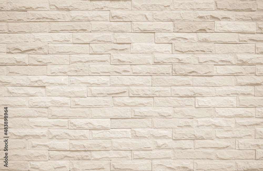 Cream and white brick wall texture background. Brickwork and stonework flooring interior rock old pattern Cream and white brick wall texture background. Brickwork and stonework flooring interior rock old pattern