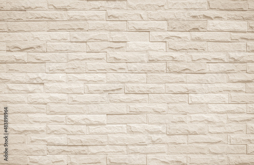 Cream and white brick wall texture background. Brickwork and stonework flooring interior rock old pattern