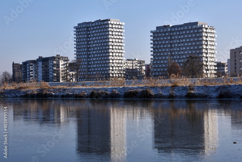 Modern residential buildings in Wroclaw  Poland with frozen Odra river.