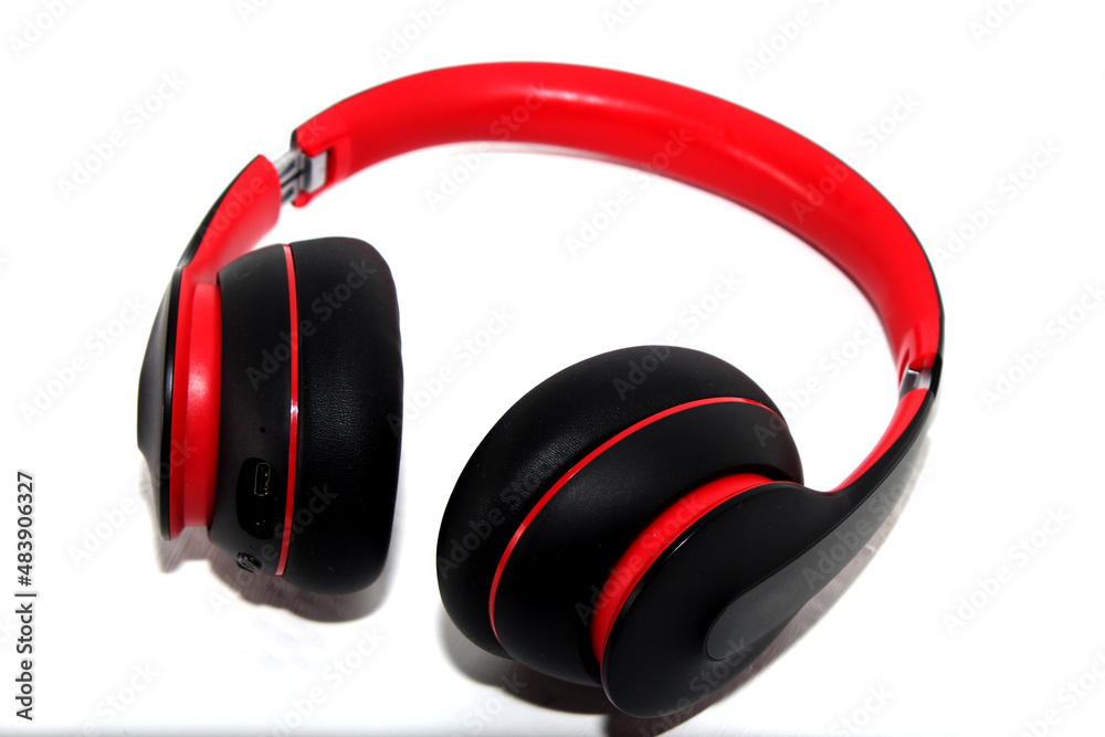 Big cool red headphones. Isolation on white. Big cool red headphones. Isolation on white.