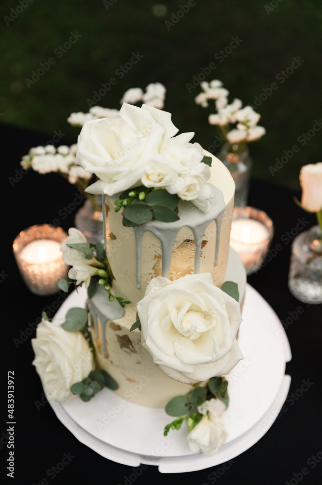 lovely wedding cake with flowers and beautiful decorations. wedding cake dessert