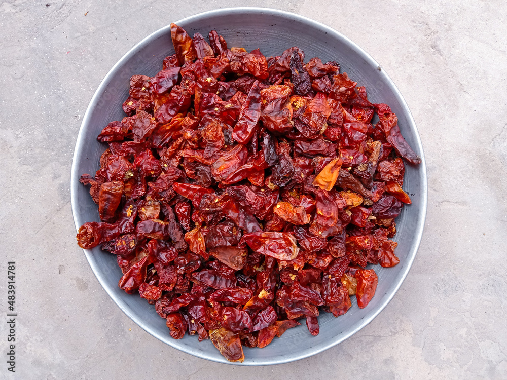 Pile or Group of dried red chili Cayenne pepper background. Red dry chili or chili Cayenne pepper as a food background. smoked dry red paprika spicy. Hot red chili pepper. Top view Pile or Group of dried red chili Cayenne pepper background. Red dry chili or chili Cayenne pepper as a food background. smoked dry red paprika spicy. Hot red chili pepper. Top view