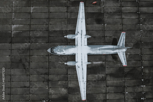 A snow-covered plane at the airport