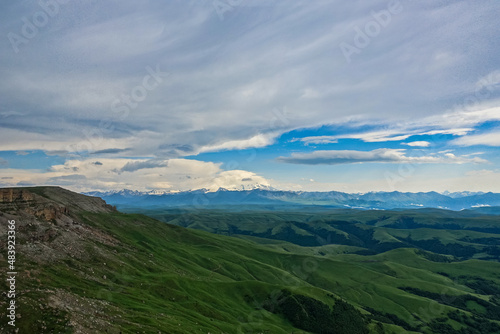 View of Elbrus and the Bermamyt plateau in the Karachay-Cherkess Republic, Russia. The Caucasus Mountains.