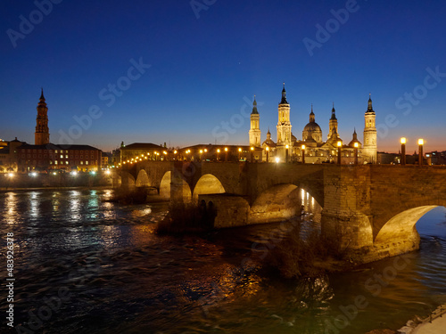 El Pilar de Zaragoza. A view of the Basilique of Zaragoza from the other side of the river Ebro. Zaragoza is in the region of Aragon  Spain.