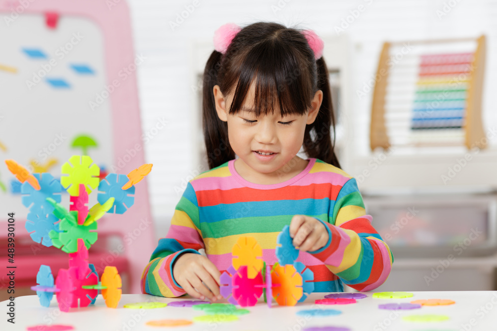 young irl playing creative toy blocks at home young irl playing creative toy blocks at home