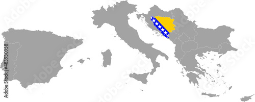 Map of Bosnia and Herzegovina with national flag within the gray map of South Europe © Milos