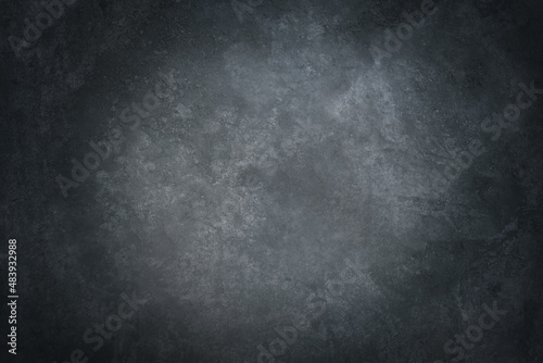sfondo di pietra con texture sfocata con parte centrale più luminosa utile come fondale  photo