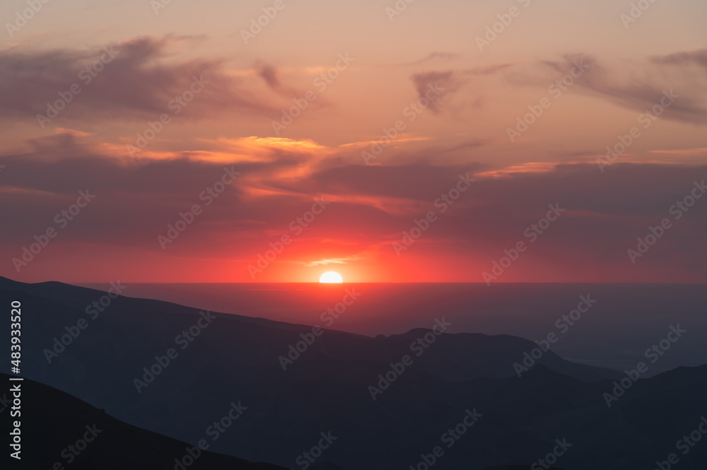 Amazing beautiful sunset in the mountains. Mountain landscape.