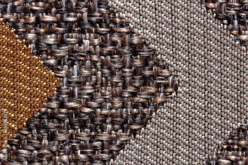 texture of jacquard fabric with geometric pattern close-up © pavelpuzzle