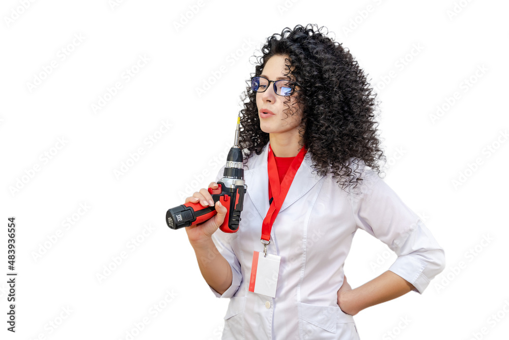 Young woman in robe holding with screwdriver (power tools) Young woman in robe holding with screwdriver (power tools)