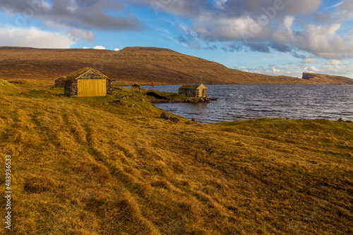 Old stone buildings for storing boats, Faroe Islands.