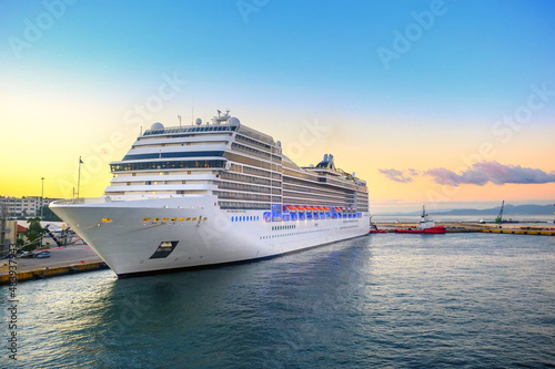 A luxury cruise ship arrived at the port at dawn. Floating liner in Europe. Journey.