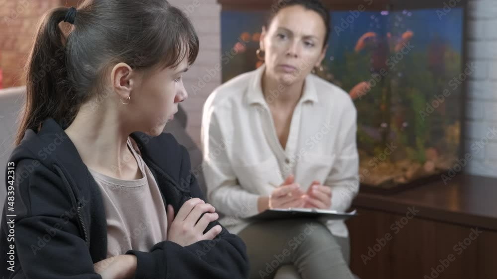 Schoolgirl mental problems. A woman try to speak the schoolgirl with psychological problems. Schoolgirl mental problems. A woman try to speak the schoolgirl with psychological problems.