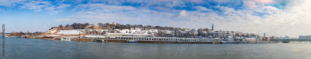 Winter panorama of Belgrade Kalemegdan fortress, Victor Monument, Sava river, confluence by day with snow