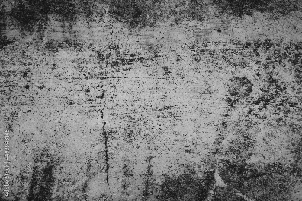 Grunge black and white cement wall texture background Grunge black and white cement wall texture background