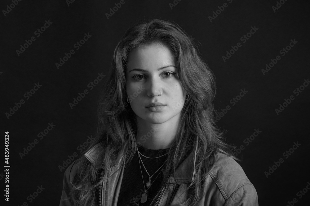 Portrait of a girl. Close-up, studio portrait. Black and white portrait Portrait of a girl. Close-up, studio portrait. Black and white portrait