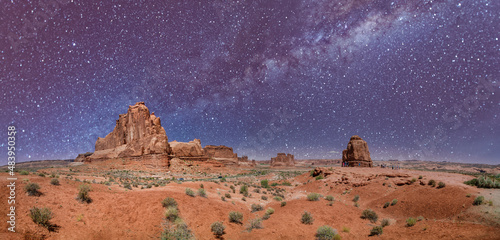 Fototapeta Starry night over rock formations, Arches National Park, Utah - USA