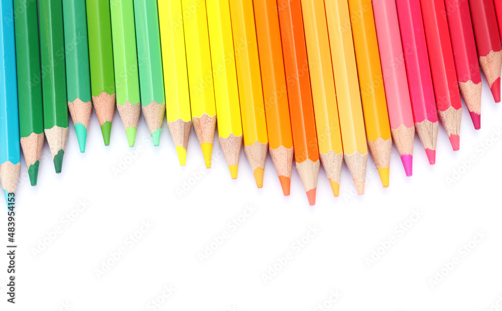 Colored pencils with isolated copy space on white background, educational frame concept. Colored pencils with isolated copy space on white background, educational frame concept.