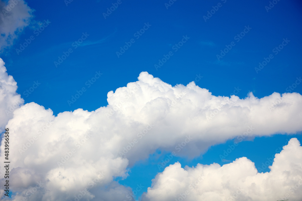Magical, white clouds in the blue sky, floating away. Rest, recuperation Magical, white clouds in the blue sky, floating away. Rest, recuperation