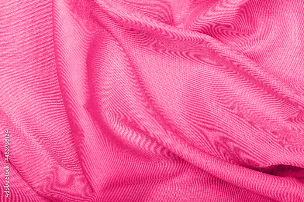 Obraz premium Pink silk fabric texture background