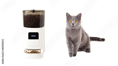 Automatic pet food dispenser isolated on white background   photo