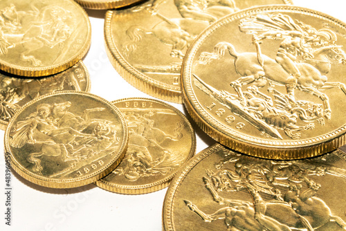 Gold Sovereign Coins Bullion on a White Background photo