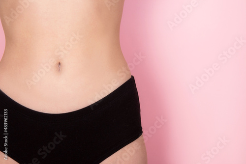 Woman in great shape, perfect body shape. Parts of a female body in underwear. Torso of slim female