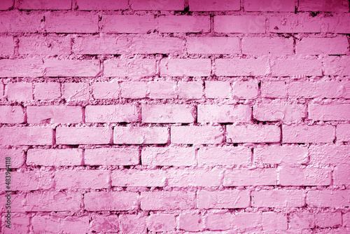 Brick wall surface in pink tone.