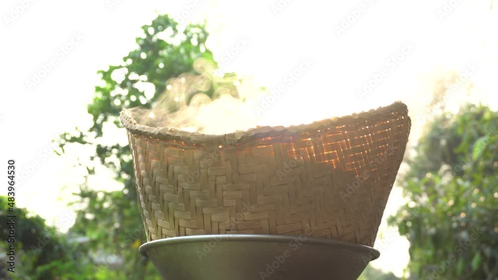 Steamed sticky rice. Steam generated by heat. Old sticky rice steaming