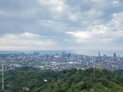 Drone view from the mountain to Batumi on a cloudy day