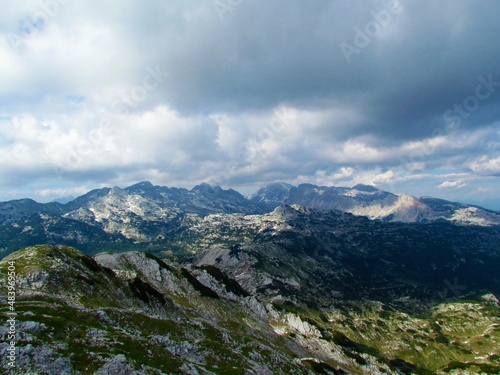 Panoramic view of mountains in the Julian alps and Triglav national park in Gorenjska, Slovenia with clouds in the sky