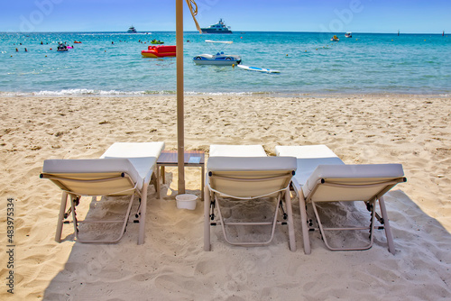 Sun loungers and umbrellas on the beach