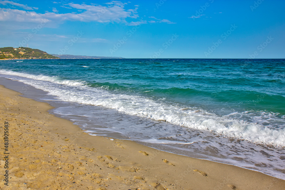 Detail from sandy Possidi cape beach in Greece