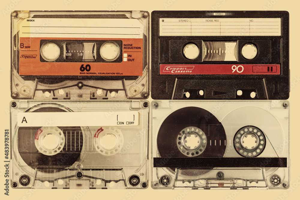 Retro styled image of four old audio compact cassettes Retro styled image of four old audio compact cassettes