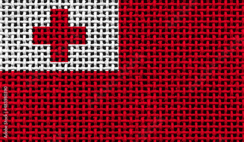 Tonga flag on the surface of a metal lattice. 3D image photo