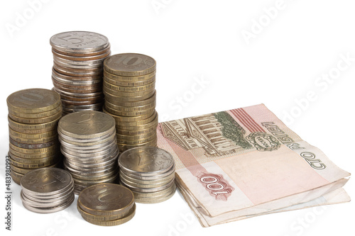 A stack of Russian coins and bills. Heap of money on white background.