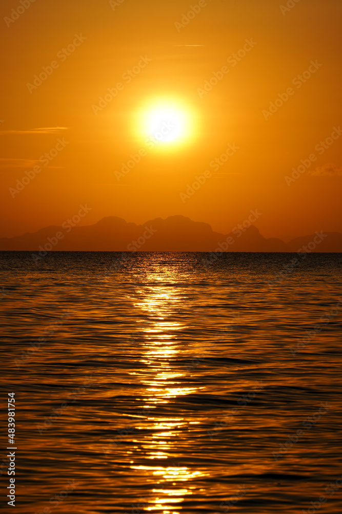 Seascape, sunset sky at the lake.