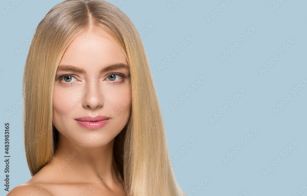 Long smooth hair beauty woman portrait blonde hairstyle. Touching her face. Color background. Blue Long smooth hair beauty woman portrait blonde hairstyle. Touching her face. Color background. Blue