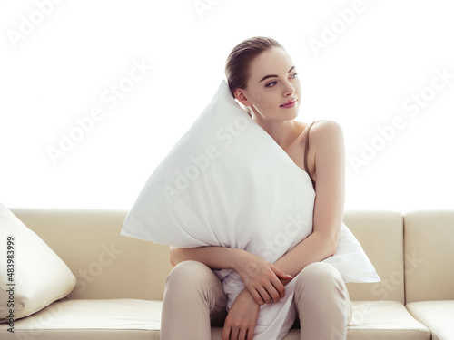 Beautiful woman home sofa with pillow happy smile brunette female beautiful model casual lifestyle